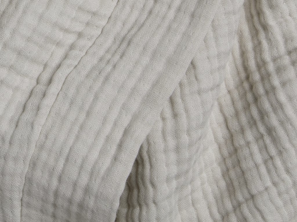 What I Like About the Parachute Cloud Cotton Robe 
The material is what really won me over. It's lightweight yet incredibly soft and cozy, made of a four-ply gauze that adds just the right layer. I don't get too hot or too cold when I wear it, making it the perfect transitional piece as the weather warms up. Honestly, I never want to take it off.
What's Worth Noting About the Parachute Cloud Cotton Robe
 Because it's made from light and breezy Turkish cotton — which I love, mind you — it's definitely on the lightweight side. So if you're hopping out of the shower expecting a thick, plush robe to bundle up in, this isn't that. Instead, it's more breathable — like a luxe, dainty extra layer (that just so happens to look really good, too). It makes the perfect gift, because not many people own robes this lightweight and soft — but once they do, I promise they'll fall in love. Just a heads-up before buying: this robe isn't meant to be hefty!
Who Is the Parachute Cloud Cotton Robe Best For?
This robe is perfect for anyone who prioritizes comfort, style, and a touch of luxury — whether you're a dedicated homebody, a new parent needing cozy moments, or someone who just wants to elevate their self-care routine. Its lightweight yet cozy fabric is ideal for people who run cold (despite being thin, it still keeps me warm!) or want a breathable layer they can wear year-round. If you're ready to trade in your worn-out loungewear for something that feels like a boutique hotel experience at home, this robe is absolutely made for you.
Additional Details

 The robe comes prewashed, so you can throw it on the moment it arrives — plus, it won't shrink in the wash.
Made from 100% Turkish cotton, it's noticeably softer than your average cotton.
It's machine-washable, so caring for it is low-maintenance. 

 Where to Shop the Parachute Cloud Cotton Robe 
This lightweight robe is available online and in store at Parachute Home. 
Rating:
