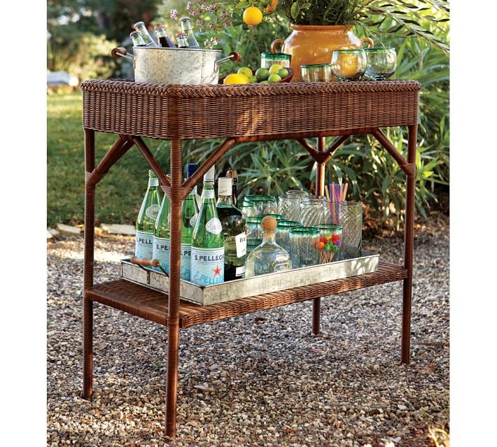 A Wicker Bar Cart (299, originally 374) is the perfect piece for