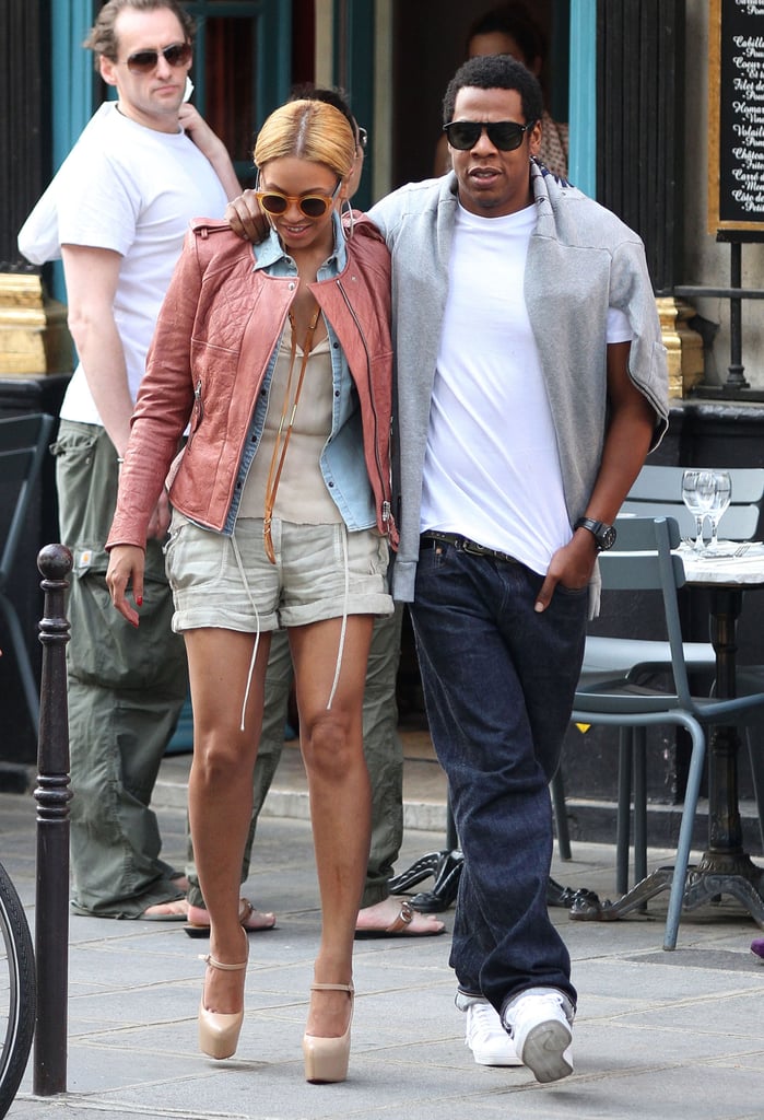 In April 2011, Beyoncé layered up in a chambray blouse and a pink leather Isabel Marant jacket while JAY-Z threw a gray sweater over his crisp white tee for a stroll in Paris.