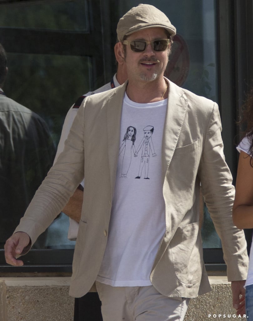 Brad Pitt Wears Homemade Shirt at Airport in France | Photos