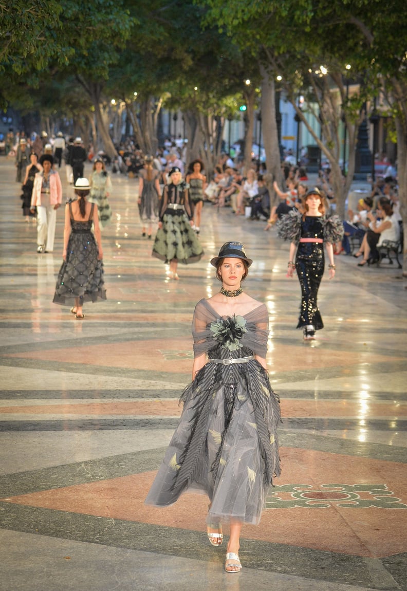 A gown and a fedora? We're into it.