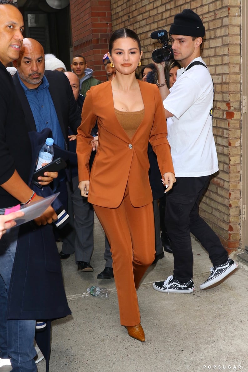 Selena Gomez Wearing a Burnt-Orange Suit and Croc-Embossed Boots in NYC