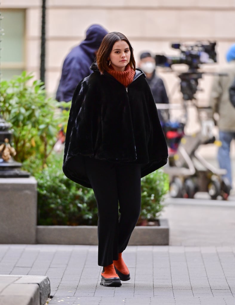 Selena Gomez Wears a Plush Velvet Cape While Filming
