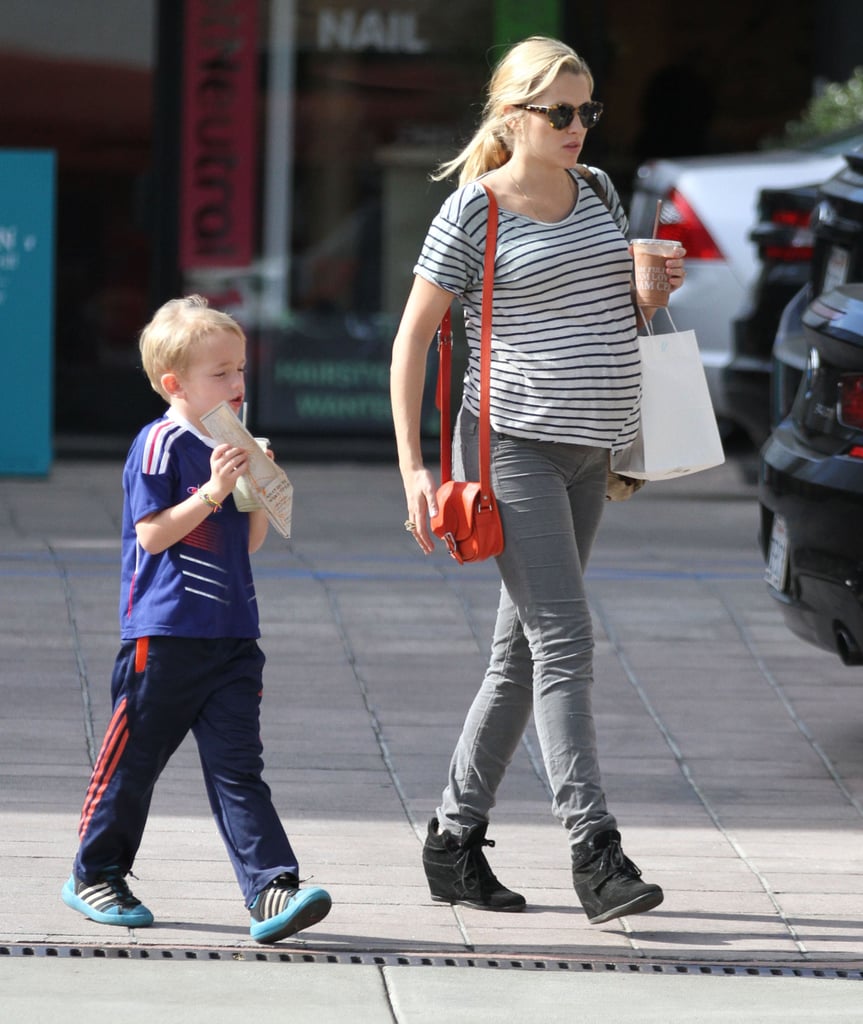 Teresa Palmer's baby bump was front and center while running errands with her future stepson, Isaac, in LA on Saturday.