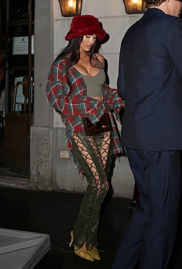 Megan Fox Wears Lace Up Croc Pants by Kim Shui in Milan