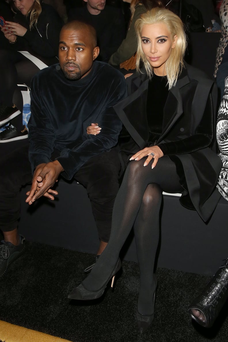 That time Kim slipped into Balmain for the show, but Kanye stuck to his signature velour.