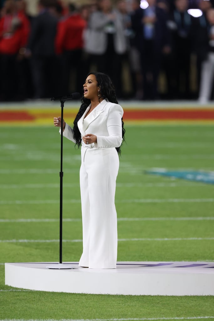 Demi Lovato's White Sergio Hudson Jumpsuit at the Super Bowl