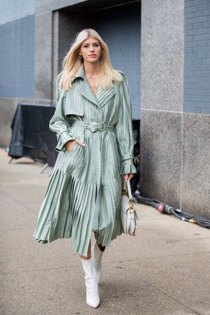 Ashley Benson totes a Marc Jacobs bag just one day after sitting front row  at his NYFW show