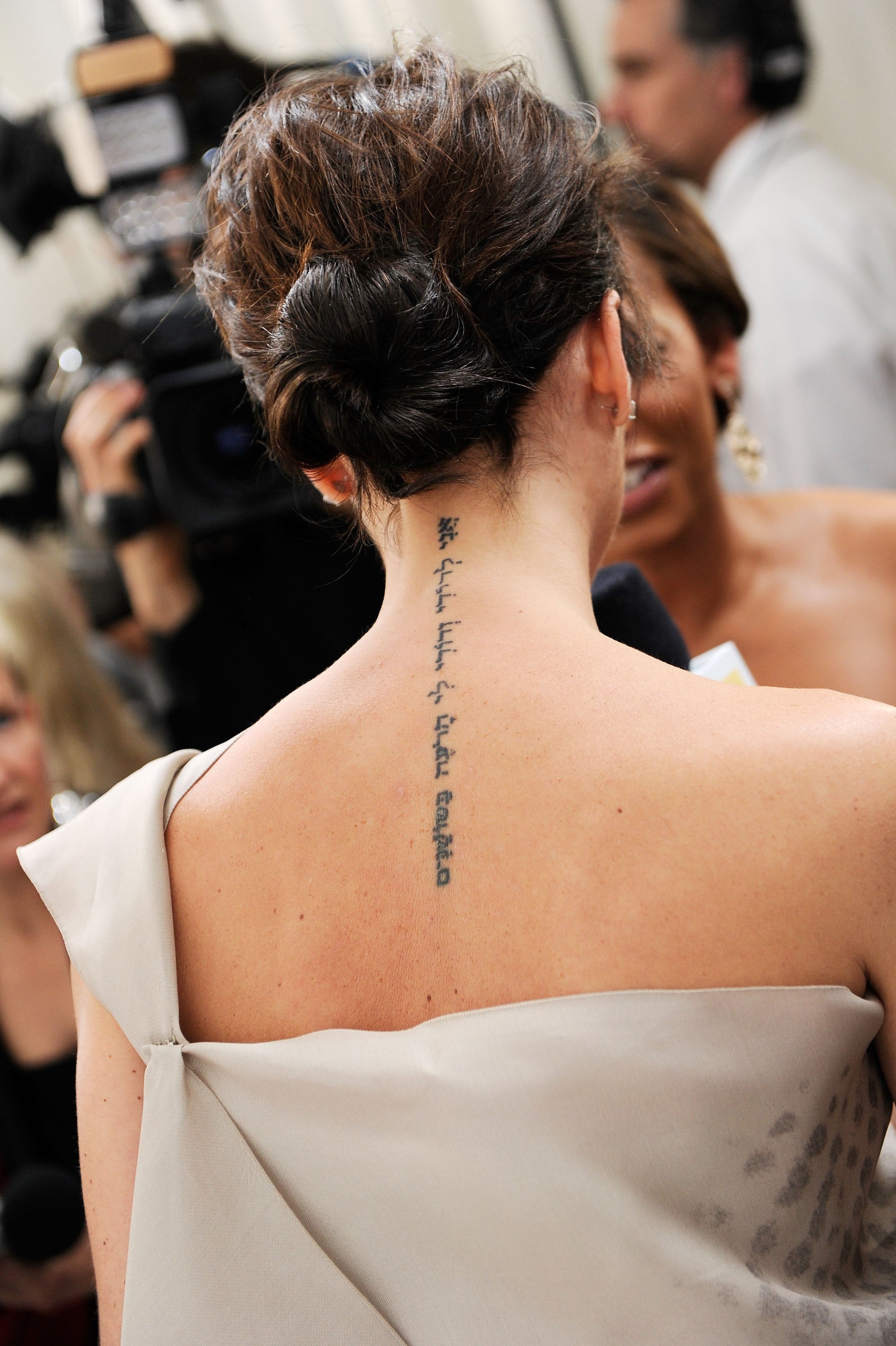 Victoria Beckham reveals tattoo dedicated to husband David is almost gone  as she stuns in a backless jumpsuit at Breast Cancer Research Foundation  bash  The Sun