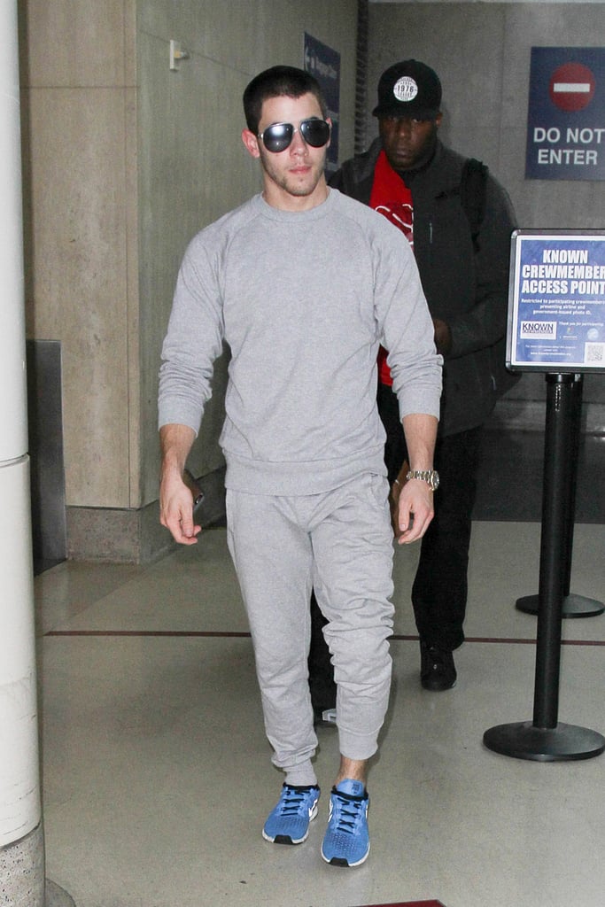 Nick Jonas Wearing Sweatpants at the Airport October 2015