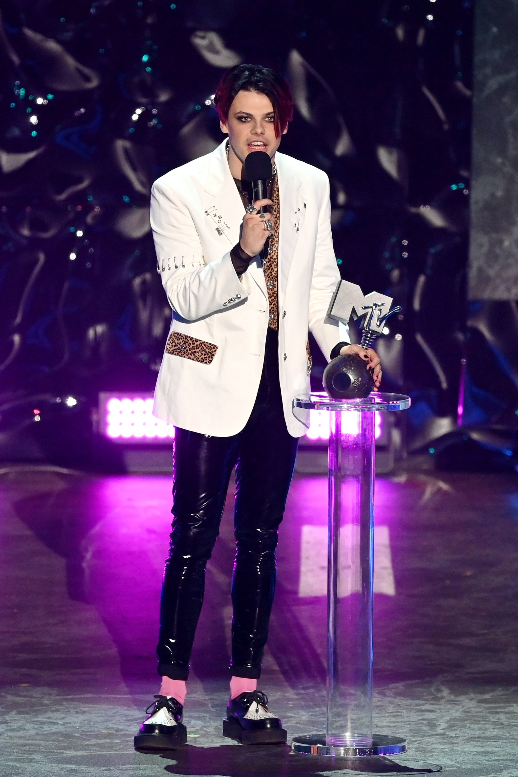 BUDAPEST, HUNGARY - NOVEMBER 14:  Yungblud accepts the Best Alternative Award on stage during the MTV EMAs 2021 'Music for ALL'  at the Papp Laszlo Budapest Sports Arena on November 14, 2021 in Budapest, Hungary. (Photo by Kate Green/MTV/Getty Images for MTV)