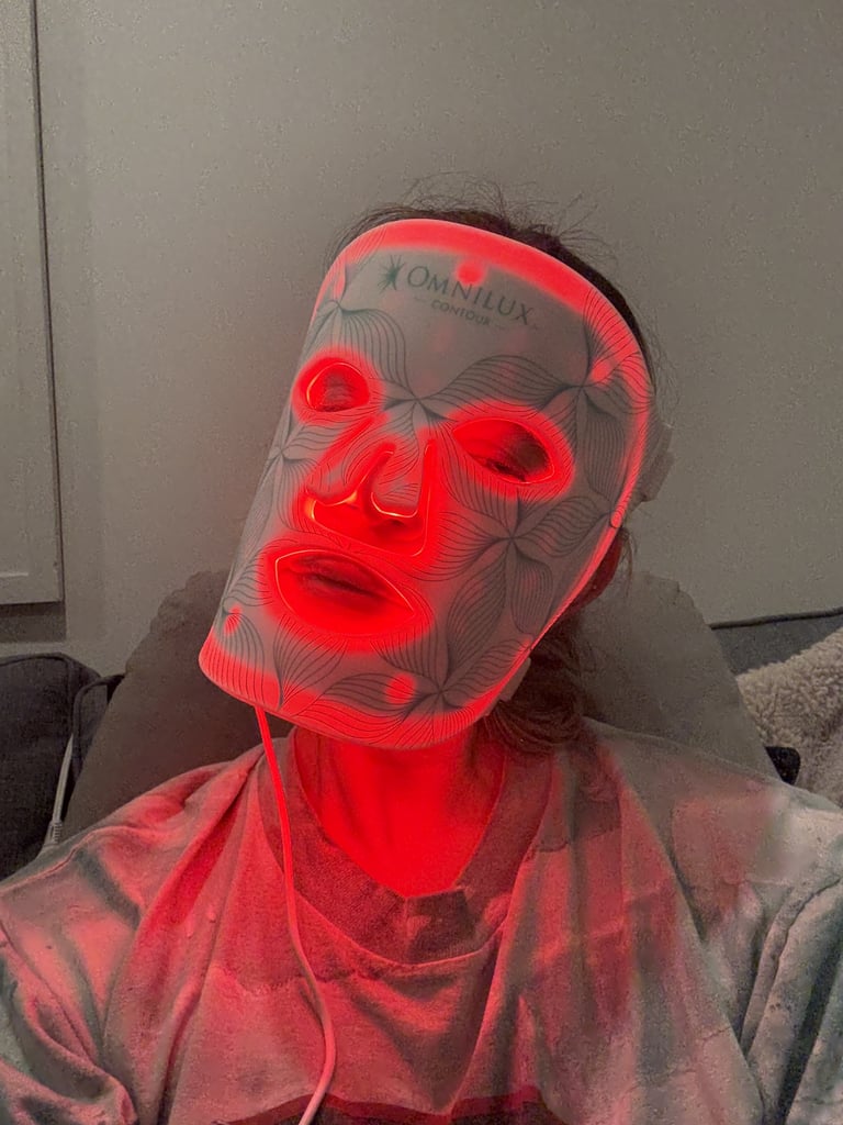Omnilux Contour Face ($395)
Out of all the antiaging products I've started to use, my red light therapy essentials have to be my favorite. The Omnilux mask is lightweight, FDA-cleared, and HSA- and FSA-eligible. It uses red and near-infrared LED wavelengths to help rejuvenate skin, fade pigmentation, and improve firmness. Sessions are 10 minutes long, so I tend to reach for it when I'm multitasking — folding laundry while watching TV in the evenings, for example — but if I really want to soak in some "me" time, I actually love making red light therapy part of my meditation. 
When I can lay under my Celluma Face ($795), another FDA-cleared product, it's a real treat. I try to wind down and decompress from the day under this flexible "dome," which emits even stronger wavelengths (blue: 465nm / red: 640nm / near-infrared: 880nm), and offers two settings, including acne and wrinkles, both at 30 minutes per session. Honestly, I'd recommend self-gifting either product, depending on what type of person you are and whether or not you like to lay down or keep moving during a session.