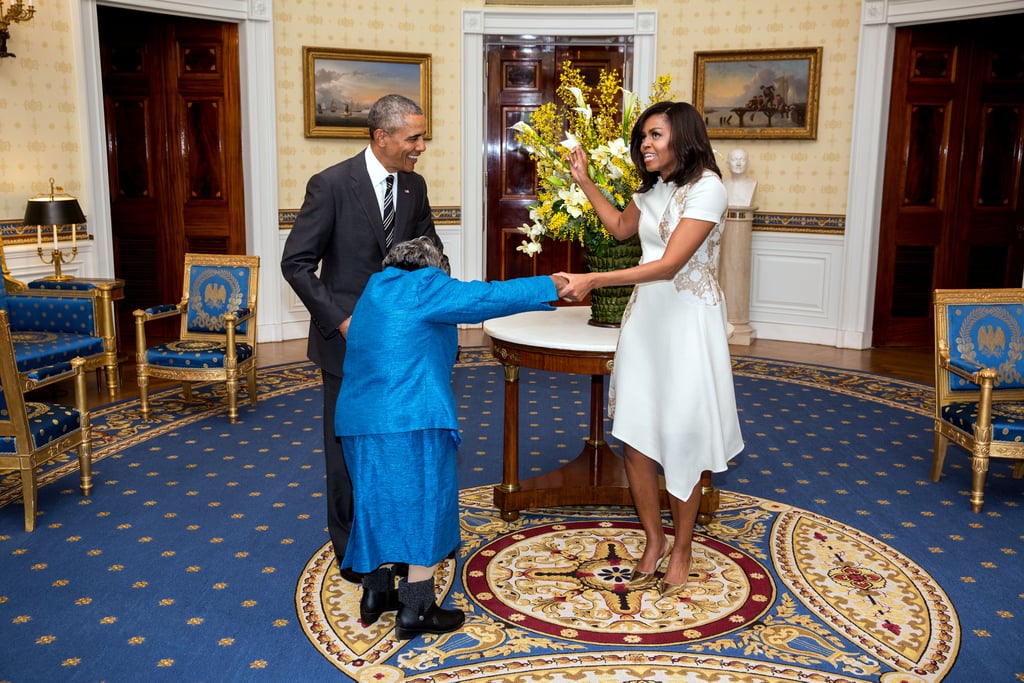 Michelle Obama Wears a White Lace Dress to Meet 106-Year-Old