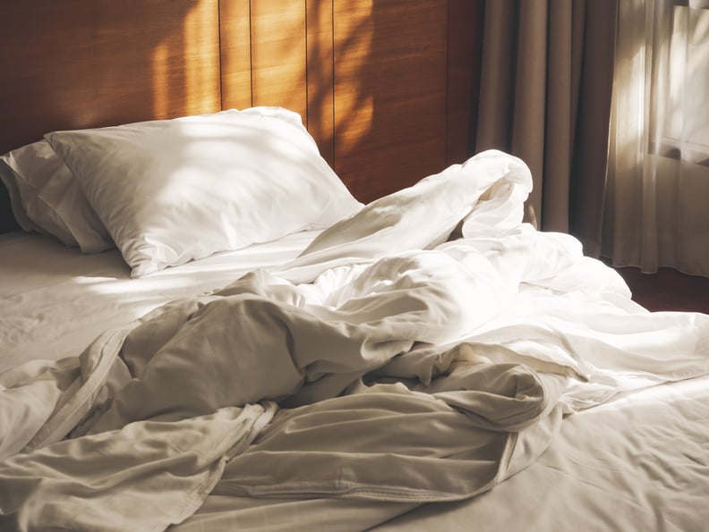 Bed Mattress Pillows Duvet unmade Bedroom Morning with sunlight Bedroom Home interior