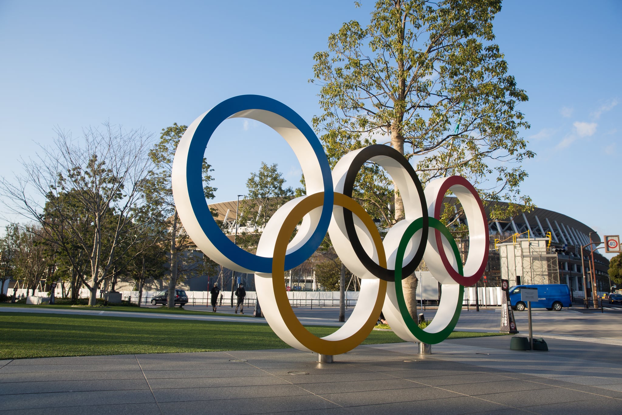 TOKYO, JAPAN - 2020/02/17: View of the Olympic Rings near the new National Stadium in Kasumigaoka, Shinjuku, Tokyo, Japan.The stadium will serve as the main stadium for the opening and closing ceremonies and for the track and field events at the Tokyo 2020 Summer Olympic Games and Paralympic Games. (Photo by Stanislav Kogiku/SOPA Images/LightRocket via Getty Images)