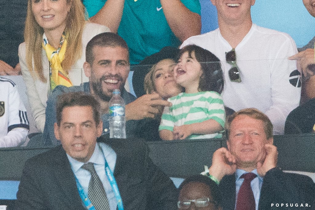Gerard Piqué, Shakira, and Milan cuddled in the stands.