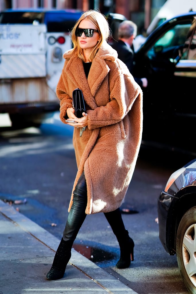 Rosie Huntington-Whiteley doesn't bend to trends. The 30-year-old model, actress, and budding entrepreneur stays true to her classic style, consisting of flattering cuts, timeless prints, and a sizable amount of seemingly effortless sex appeal — even when wrapped up in a massive coat that looks not unlike your childhood teddy bear.
Rosie recently stepped out in New York City wearing Max Mara's Teddy Bear Icon Coat, which she paired with leather pants, ankle boots, and a Saint Laurent clutch. Unfortunately, the cozy coat is completely sold out for the time being. Since it's such a classic wintertime staple, however, there are fortunately plenty of similar finds. Shop all of the fuzzy camel coats your heart could ever desire ahead.

    Related:

            
            
                                    
                            

            Rosie Huntington-Whiteley Straight Up Stole Kate Moss&apos;s Look, and She&apos;s Damn Proud of It