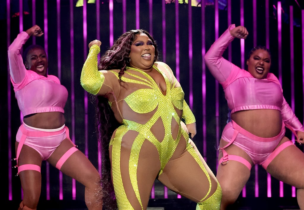 Lizzo Wears Neon Bedazzled Catsuit On Special Tour Popsugar Fashion 