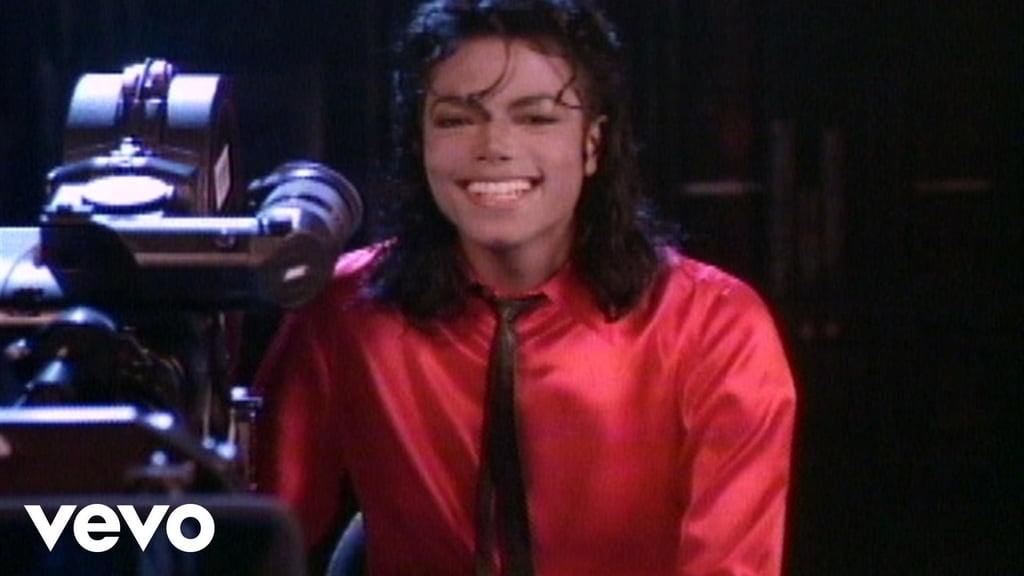 John Travolta, Olivia Newton-John, Whoopi Goldberg, Lou Ferrigno, Dan Aykroyd, and others in Michael Jackson's "Liberian Girl"