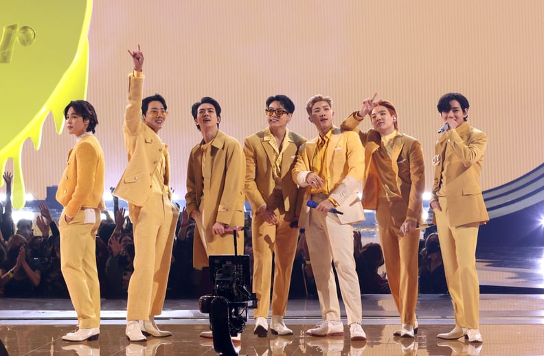 LOS ANGELES, CALIFORNIA - NOVEMBER 21: (L-R) Jimin, J-Hope, Jin, Jungkook, RM, Suga, and V of BTS perform onstage during the 2021 American Music Awards at Microsoft Theater on November 21, 2021 in Los Angeles, California. (Photo by Kevin Winter/Getty Imag