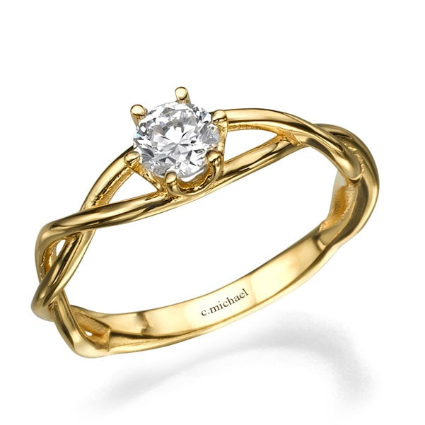 What's more everlasting than infinity? A 14k yellow gold engagement ring ($1,250) seals the deal.