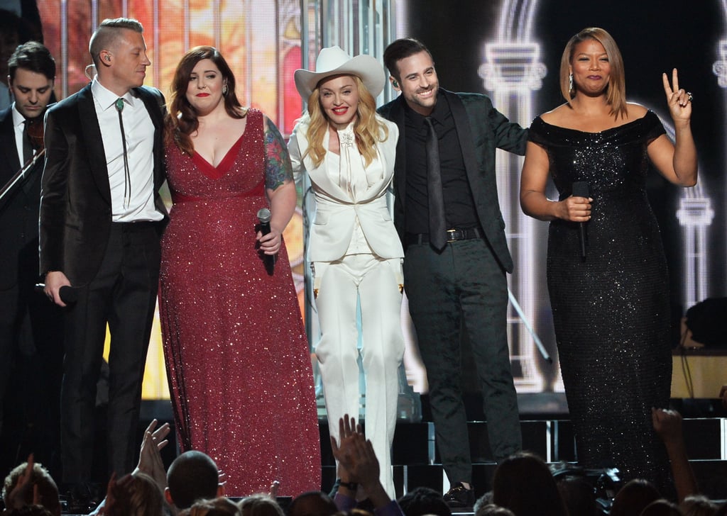 Queen Latifah held up a peace sign as the performers linked up on stage.