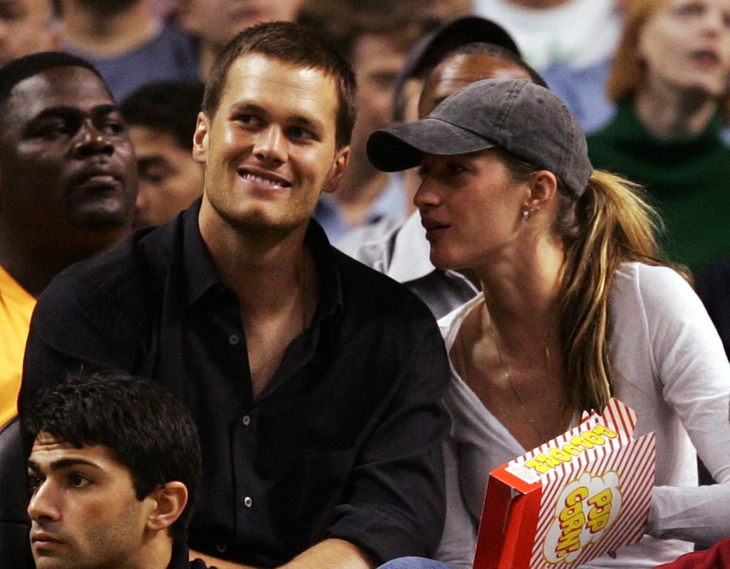 Tom Brady and Gisele Bündchen ate popcorn while watching the Boston Celtics play in May 2008.