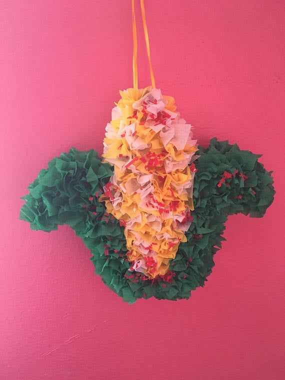 This piñata is perfect for your birthday party. 
Elote Piñata ($20)