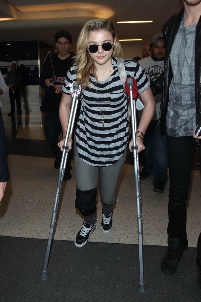 Chloë Grace Moretz was a good sport in crutches at LAX on Wednesday.