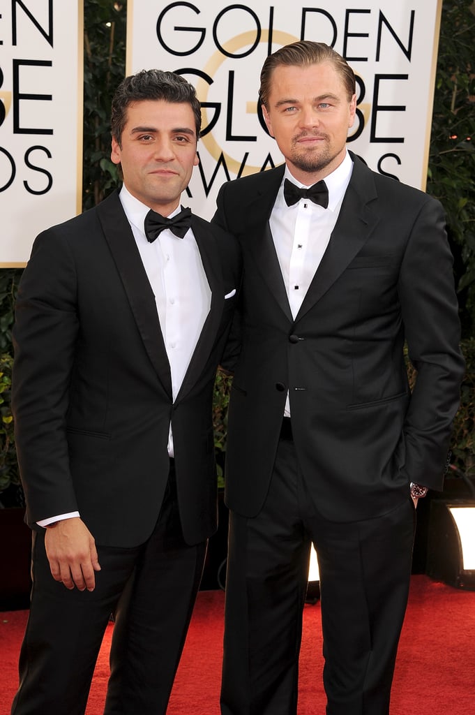 Oscar Isaac and Leonardo DiCaprio may be going against each other in the best actor category, but they looked friendly on the carpet.