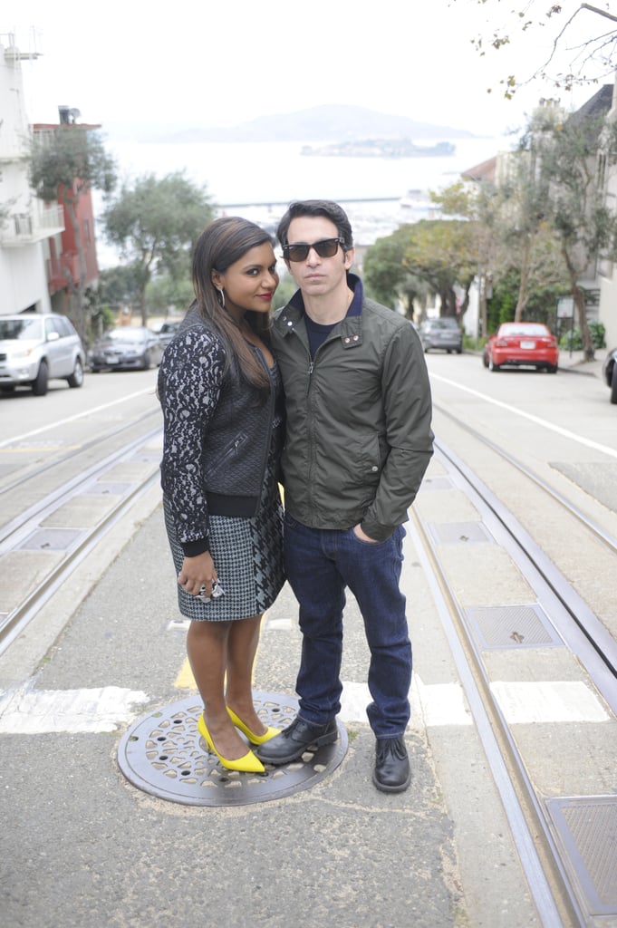 The pair walks along the hilly streets of San Francisco.