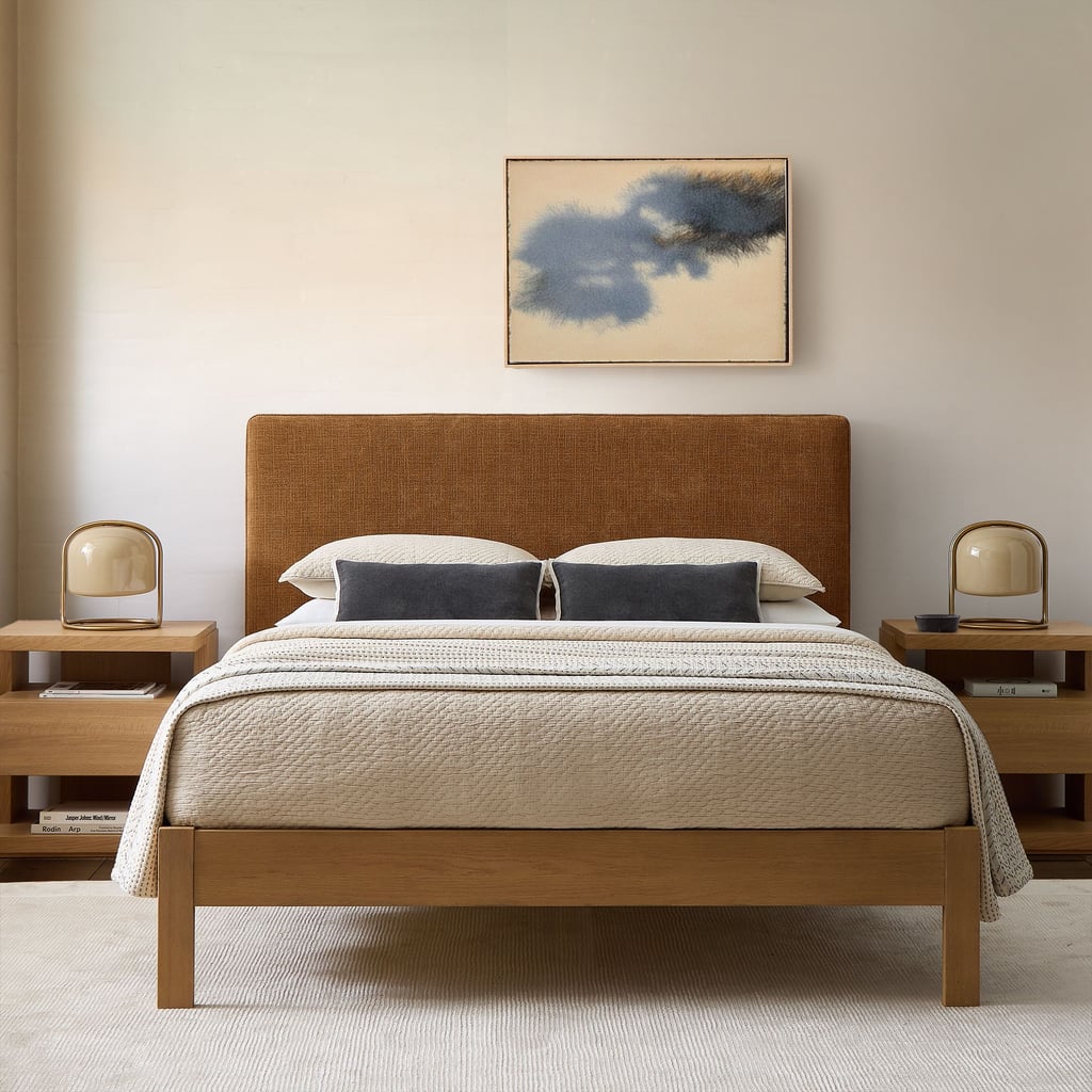 West Elm Bondi Headboard ($399-$649)
If you like having control over the details, this headboard makes it easy to customize the look. You choose the fabric and the placement, so your bed feels designed around your space.
What we love:
Comes in a wide range of performance fabrics and colors.
Wall-mounted design lets you choose the height for a more intentional, styled setup.
Thick padding and contract-grade construction give it a sturdy, high-quality feel.
GREENGUARD Gold Certified, making it a solid option for a healthier home.
Who it's best for:
Anyone who wants a polished, custom-feeling headboard and doesn't mind mounting it to the wall for a more elevated look.
Who should avoid it:
If you're renting and can't drill into walls, or you prefer a headboard that attaches directly to the bed frame.
The Details: Material: Padded engineered wood frame with upholstered performance fabric | Sizes: Twin, Full, Queen, King, California King | Color Options: 22