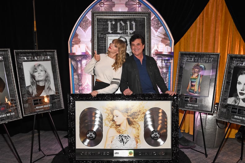 EAST RUTHERFORD, NJ - JULY 21:  Taylor Swift (L) and  CEO of Big Machine Records Scott Borchetta plaque presentation backstage at the Taylor Swift reputation Stadium Tour at MetLife Stadium on July 21, 2018 in East Rutherford, New Jersey.  (Photo by Kevin