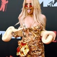 Let the Antics Begin! H.E.R. and Tana Mongeau Both Brought Snakes to the VMAs Red Carpet