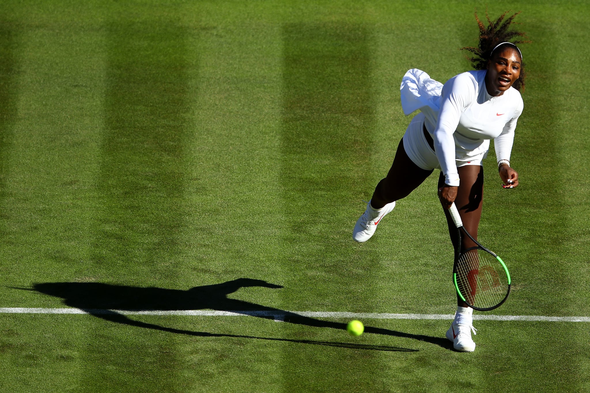 LONDON, ENGLAND - JULY 02: Serena Williams of The United States serves against Arantxa Rus of The Netherlands during their Ladies' Singles first round match on day one of the Wimbledon Lawn Tennis Championships at All England Lawn Tennis and Croquet Club on July 2, 2018 in London, England. (Photo by Clive Mason/Getty Images)