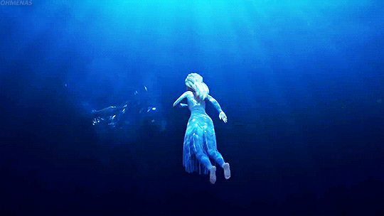 Mid water-fighting, Elsa falls underwater where she encounters a blue-eyed horse made entirely of water, which appears in a flash of lightning before disappearing right before her eyes. The synopsis reveals that the horse is actually Nokk, "a mythical water spirit that takes the form of a horse and uses the power of the ocean to guard the secrets of the forest."
Typically Nokk serves as a sort of siren in the Germanic legends it originates from (how like Disney to use a dark fairy tale), luring folks to their deaths rather than being a guide, as Nokk seems to be for Elsa in the Frozen 2 trailer. But, we won't actually know if the magical entity is a friend or foe to our Queen until the movie actually premieres.
