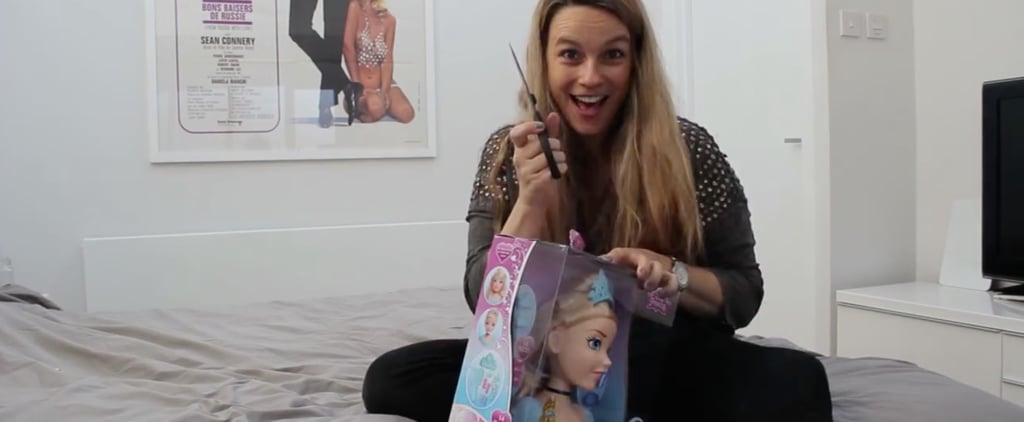Mom Struggling to Get a Toy Out of the Box