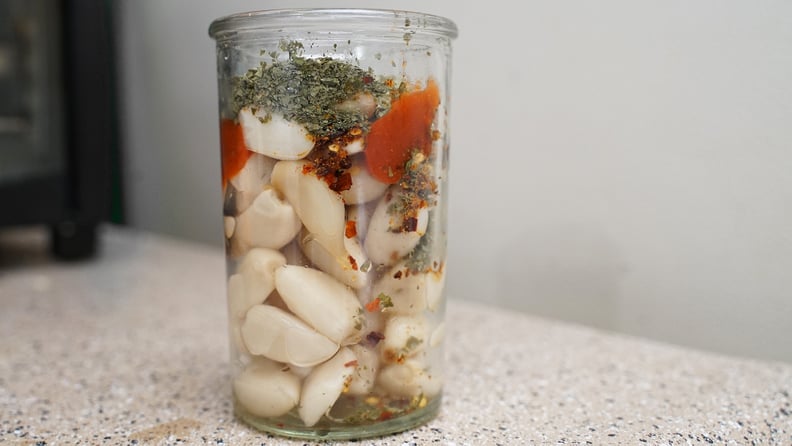 tiktok"s spicy pickled garlic recipe: adding spices