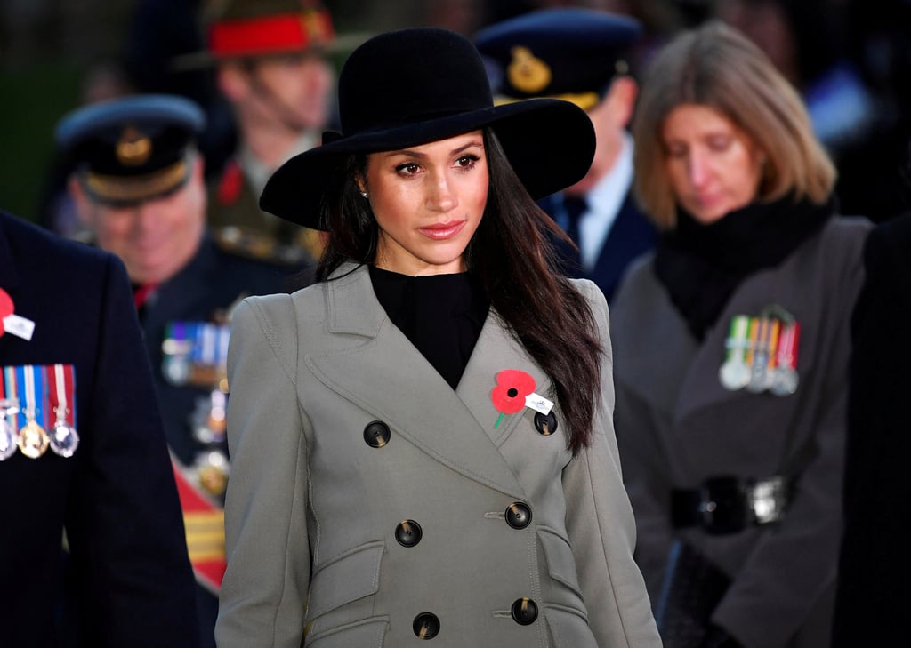This similar gray coat from Smythe, which Markle wore for Anzac Day in 2018, is one of the many double-breasted coats she's sported for her outdoor appearances.