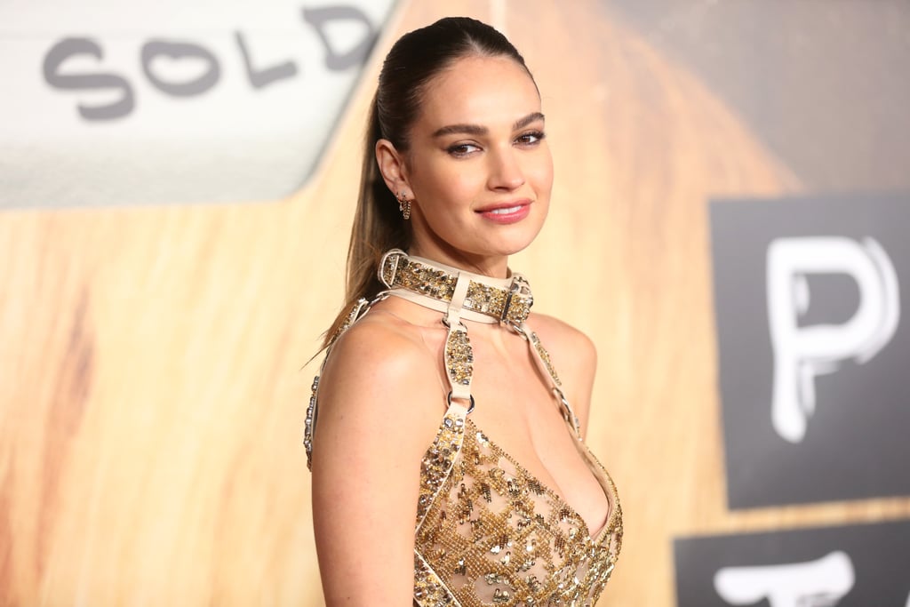Lily James Wears a Sheer Roberto Cavalli Dress on Red Carpet