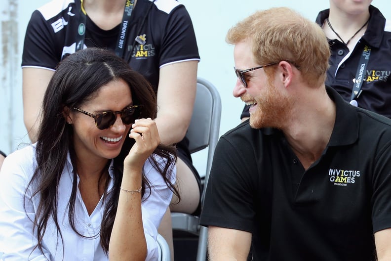TORONTO, ON - SEPTEMBER 25:  Prince Harry (R) and Meghan Markle (L) attend a Wheelchair Tennis match during the Invictus Games 2017 at Nathan Philips Square on September 25, 2017 in Toronto, Canada  (Photo by Chris Jackson/Getty Images for the Invictus Ga