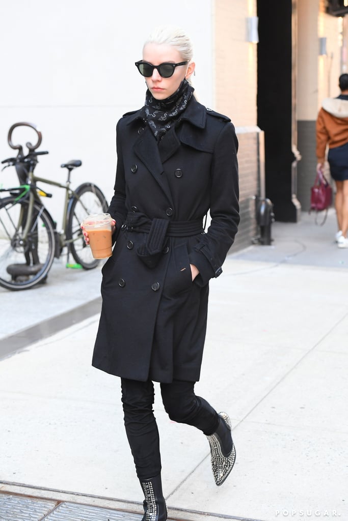It was all-black, but definitely not so boring for Anya's coffee run in Soho. She worked a double-breasted black trench over skinny jeans tucked into studded pointed-toe booties and accessorised with sunglasses and a printed scarf.