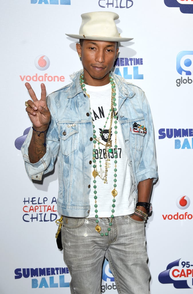Pharrell Williams was all about denim and peace at the Capital FM Summertime Ball at Wembley Stadium in London on Saturday.