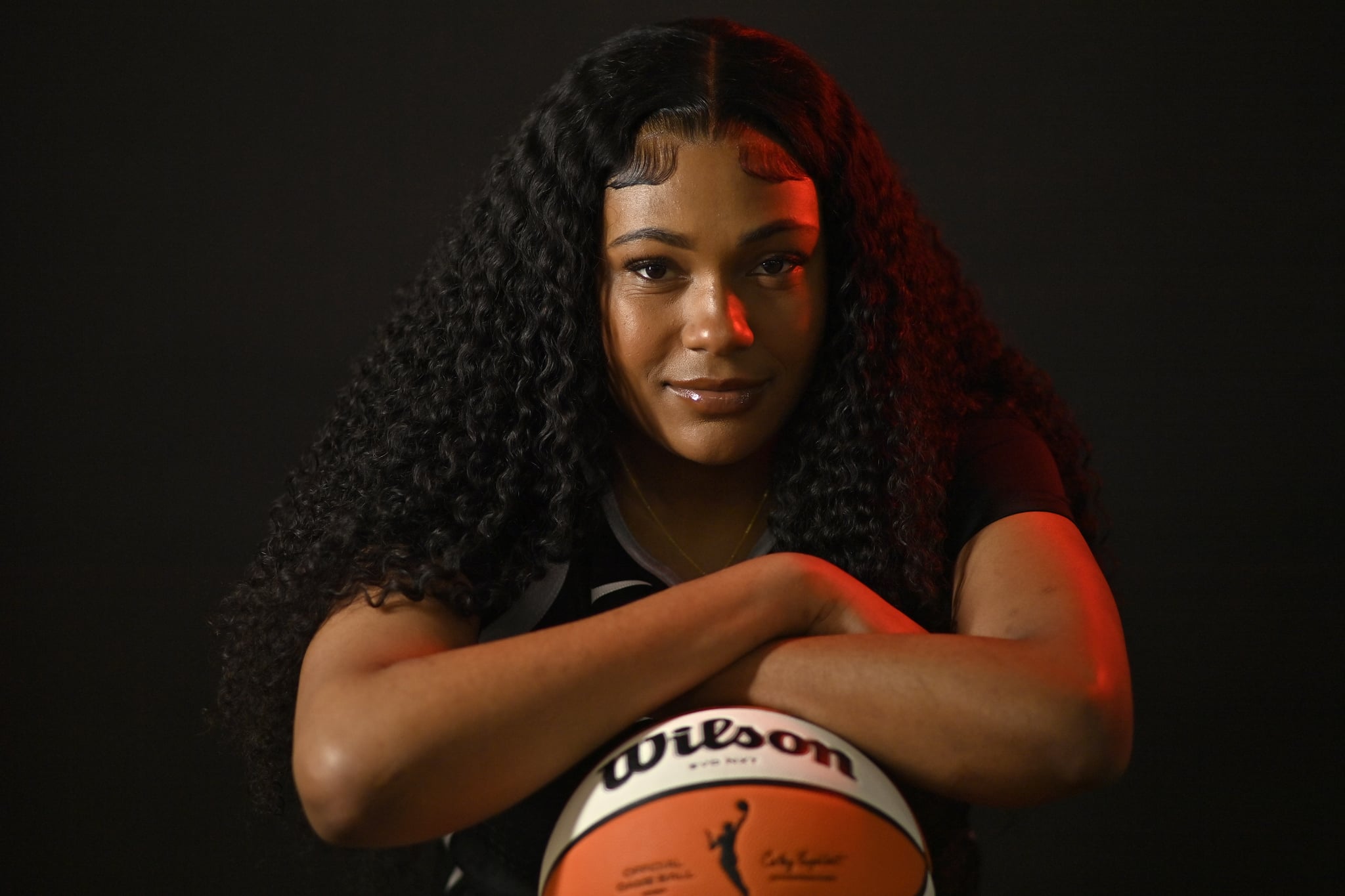 LAS VEGAS, NEVADA - MAY 03: Angel Jackson #15 of the Las Vegas Aces poses for a head shot during the WNBA media day at Vu Studios on May 03, 2024 in Las Vegas, Nevada. NOTE TO USER: User expressly acknowledges and agrees that, by downloading and or using this photograph, User is consenting to the terms and conditions of the Getty Images License Agreement. (Photo by David Becker/Getty Images)