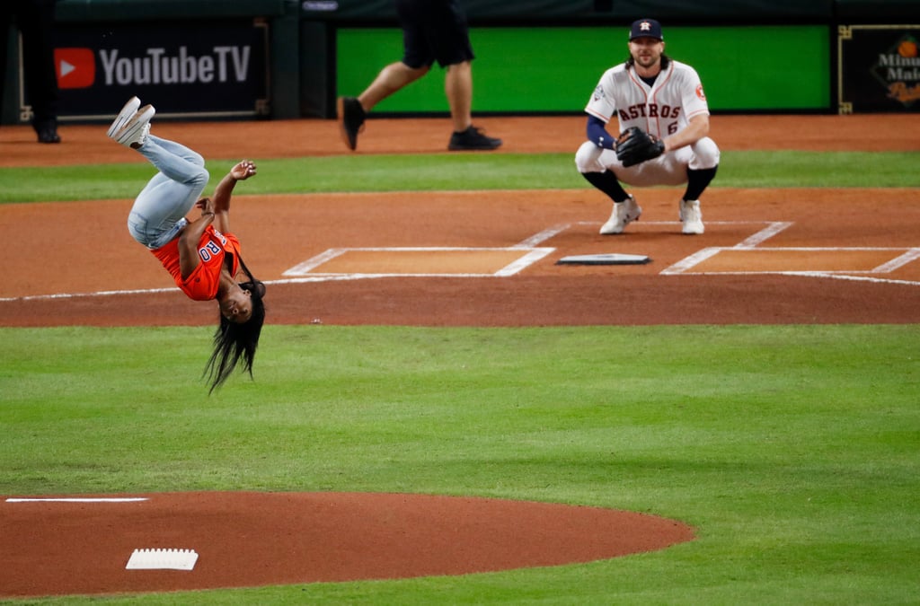 Watch Simone Biles Flip Before Throwing World Series Pitch