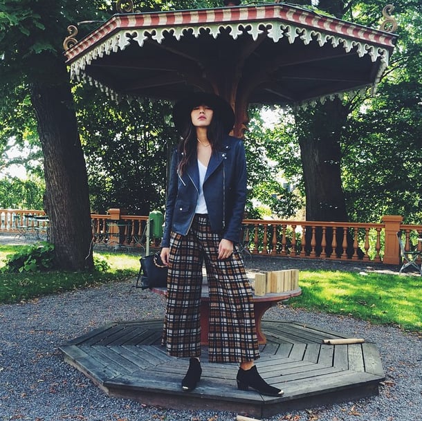 If you were going to try culottes, you probably bought them for Summer and sported them with crop tops and slider sandals. But a plaid pair complements your closed-toe booties and a leather moto jacket in a way that's hip and edgy.
Source: Instagram user natalieoffduty