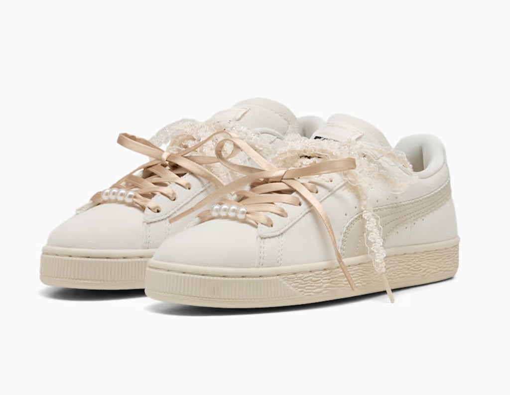 Puma Suede Bloom Sneakers ($90)
There's nothing subtle about this sneaker design, and that's exactly why we love it. It lets you use your footwear as a maximalist accessory thanks to the mismatched satin and lace shoelaces adorned with pearl beads. Available in six different colorways, there are countless ways to style this unique set into your wardrobe.