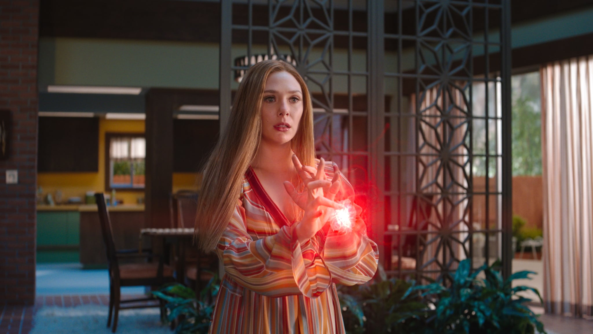 Elizabeth Olsen as Wanda Maximoff in Marvel Studios' WANDAVISION exclusively on Disney+. Photo courtesy of Marvel Studios. ©Marvel Studios 2021. All Rights Reserved.