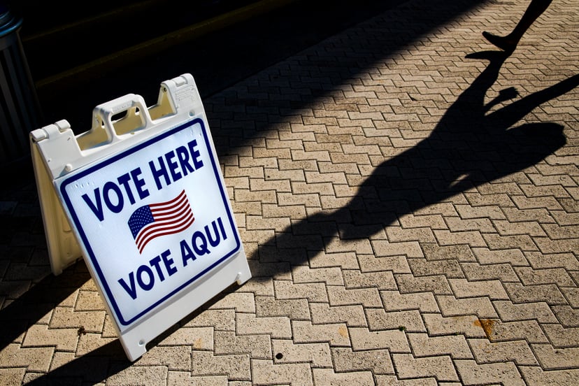 A vote here sign outside a polling location in Miami Beach, Florida, U.S. Photographer: Scott McIntyre/Bloomberg