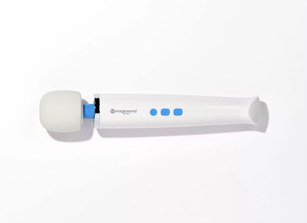 Magic Wand Mini ($76, originally $100)
The Magic Wand is viral for a reason: it has three intensity levels so you can customize your experience, and with a 6,000 RPM motor, it delivers a powerful performance every time. The mini version of the Magic Wand is perfect for travel. It's compact and has a rechargeable battery for a runtime of 2.5 hours of undisturbed bliss. Our contributing editor raved about the sex toy in her Magic Wand review.
Editor Quote: "The first time I tried the Magic Wand, I brought it in the bedroom with my partner, and the cult-classic sex toy exceeded my expectations. Not only did my orgasm come so naturally when I used it with my partner, but it came quicker than I ever thought was possible. The second time I used it, I masturbated by myself, and while it took a little longer than two minutes for me to orgasm, I was not expecting that kind of visceral response." — Brittany Beringer-Tobing, contributing editor